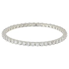 Radiance by Absolute™ Sterling Silver Round Stone Bangle Bracelet Do modern glamour. Start by adding this bangle's sleek and stone-intensive design to your jewelry stash. Classic shapes and bold sparkle make it a key part of your everyday wardrobe.       Small/Medium approx. 6-3/4"L; fits 5" to 6-3/4" wrist     Medium/Large approx. 7-1/2"L; fits 5-1/2" to 7" wrist     Stamped .925 sterling silver; rhodium plating or goldtone; polished finish     No clasp; slip on   Stone Information       All si Silver Adjustable Eternity Band, Adjustable Stackable Cubic Zirconia Diamond Bracelet, Flexible Cubic Zirconia Bangle Bracelet, Modern Stackable Round Bracelets, Modern Round Cubic Zirconia Bracelets, Adjustable Stackable Tennis Bracelet Bangle, Modern Stackable Round Tennis Bracelet, Modern Stackable Adjustable Tennis Bracelet, Modern Adjustable Stackable Tennis Bracelet