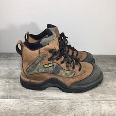 Up For Sale Is A Good Condition Pair Of Danner 47300 Radical 45 Camo Gore-Tex Waterproof Work Men’s Leather Soft Toe Boots. Size 7 D, Medium. Leather Uppers. Rubber Soles. From Smoke-Free Home. Clean Inside And Out. Very Well Built And Sturdy. Approximate Outside Dimensions: 11.25 Inches Heel To Toe By 4.25 Inches Across The Ball Of Footwear By 1.5 Inches Tall Heels By 5 Inches Tall. Impact Resistant Leather Lace-up Hiking Boots, Slip-resistant Snip Toe Waterproof Boots For Outdoor, Slip-resistant Hiking Boots With Closed Toe, Casual Slip-resistant Snip Toe Waterproof Boots, Gore-tex Waterproof Boots With Reinforced Round Toe, Functional Waterproof Boots With Reinforced Toe, Gore-tex Waterproof Boots With Reinforced Toe, Impact Resistant Round Toe Walking Boots, Slip-resistant Round Toe Work Boots For Outdoor