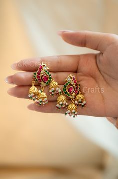 Add some whimsy to your wardrobe with the Pink Kundan earrings. Featuring a beautiful peacock motif and encrusted with kundan, these earrings also have small jhumkis for a touch of playfulness. A must-have for any quirky fashionista! Closure - Push Back Weight - 20gm (pair) Desi Jewelry, Earrings Kundan, Peacock Motif, Pink Peacock, Beautiful Peacock, Jhumki Earrings, Kundan Earrings, Jewelry Earrings Studs, Pearl Jewelry