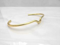 Valle Bangle, Contemporary brass, Mahnal Jewelry Elegant Hand Forged Adjustable Bangle, Elegant Adjustable Hand Forged Cuff Bracelet, Adjustable Contemporary Bangle Bracelet, Modern Adjustable Hand Forged Bangle, Contemporary Necklace, Cuff Bracelets Handmade, Adjustable Bangle, In Spanish, Modern Woman