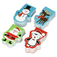 four christmas themed coasters with santa, snowman and reindeer images on the front