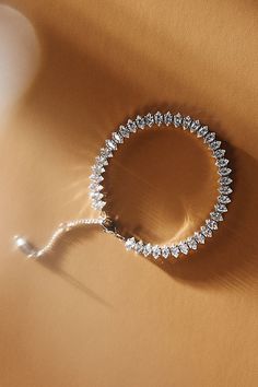 Lend a touch of glamour to your look with this dazzling tennis bracelet. Single Pearl Necklace, Diamond Bracelet Design, Crystal Chandelier Earrings, Vintage Inspired Jewelry, Mini Hoop Earrings, Bride Accessories, Wedding Party Jewelry, Tennis Necklace, Jewelry Photography