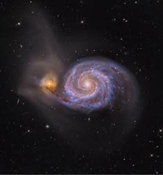 an image of a spiral galaxy in the sky