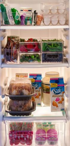 an open refrigerator filled with lots of food