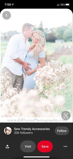 a couple kissing in the middle of a field