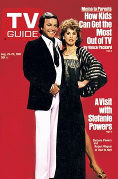 the tv guide magazine cover features an image of two people standing next to each other