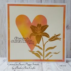 a card with a heart and flower on it