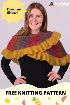 a woman wearing a yellow and red knitted shawl