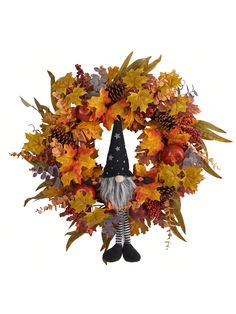 a wreath with an gnome and autumn leaves