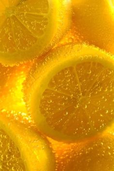 close up view of lemon slices and bubbles