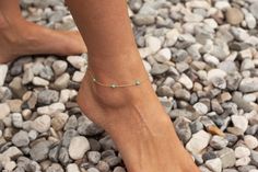 Gold turquoise anklet, simple turquoise ankle bracelet with 3mm beads. A bohemian foot bracelet for summer and beach activities. This item can be made in solid gold as well. Please contact us before purchase. Details Material: sterling silver or yellow/rose gold filled Gemstones: turquoise beads Measurements: approx. 3mm Size: 8-11 inches (Standard size is 10 inches. Larger and smaller sizes are available as well. Priced upon request.) Procedure information Please select the material and size fr Elegant Turquoise Anklets For Summer, Elegant Turquoise Anklets For The Beach, Dainty Summer Anklets, Adjustable Turquoise Dainty Anklets, Dainty Adjustable Turquoise Anklets, Turquoise Ankle Bracelet, Turquoise Anklet, Foot Bracelet, Leg Chain