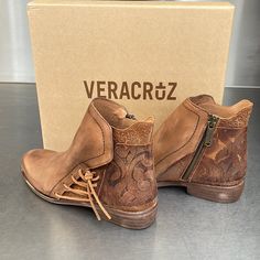 Tan And Brown Embossed Leather Ankle Boots By Vera Cruz. Side Leather Tie Details And Zipper Closure. So Comfortable With Low Heel. Available In Size 36 (6), 37 (6.5-7), 39 (8-8.5) And 41 (10-10.5). New In Box From Sundance. List Price Is $248, Asking $125. Desert Shoes, Ankle Cowboy Boots, Cowboy Ankle Boots, Salt Of The Earth, Vera Cruz, Slouchy Boots, Leather Tie, Block Heel Boots, Brown Ankle Boots