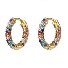 Small hoops covered in colorful rhinestones. Fun and easy to match to any outfit. Gold plated. Length: 0.83", Height: 0.79" - Care Instructions: Avoid contact with water, lotion, and perfume. Clean gently with a polishing cloth. Product Specifications: - Stylish and waterproof design - Enhances any outfit with a touch of elegance - Perfect for all-day wear Rain Earrings, Crystal Dangle Earrings, Rainbow Beads, Rainbow Earrings, Ear Cuffs, Feel Beautiful, Small Earrings, Hoop Earrings Small, Cuff Earrings