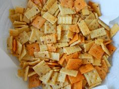 a pile of cheesy crackers sitting on top of a white paper towel