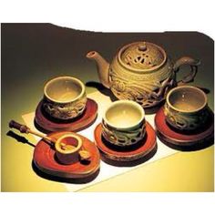 a tea set is sitting on a table