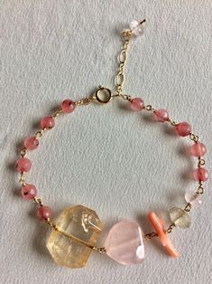 14k gold filled bracelet rondelles bracelet wire wrapped | Etsy Dainty Pink Beaded Bracelets With Gemstone Beads, Handmade Pink Rosary Bracelet For Healing, Bohemian Pink Wire Wrapped Beaded Bracelets, Dainty Pink 14k Gold-filled Bracelets, Dainty Pink 14k Gold Filled Bracelets, Bracelet Rosary, Multi Gemstone Bracelet, Yellow Quartz, Rosary Bracelet