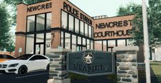 two cars are parked in front of a new orleans police station sign and entrance to the building