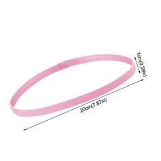 a pink rubber bracelet with an adjustable clasp on the end, and measurements for it