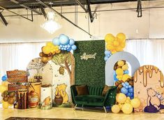 a room filled with lots of balloons and decorations