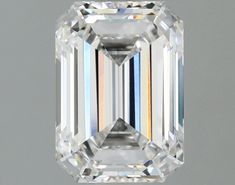 an emerald - cut diamond is shown in this undrecognized image, which appears to be part of a jewelry collection