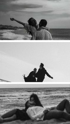 two people laying on the beach with their arms in the air and one person standing up