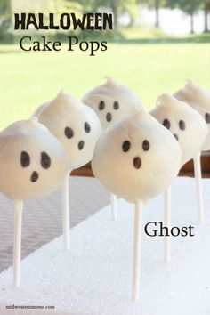 halloween cake pops with ghost faces on them