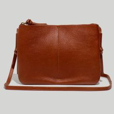 Madewell The Knotted Crossbody Bag, 100% Brown Leather Nwt Simple, Streamlined And Totally Essential, This Rich Leather Bag Has Two Slide Pockets In Front For Your Phone And Id Plus A Zippered Compartment For Your Wallet And Keys. (Psst, The Knotted Crossbody Strap Unties So You Can Adjust The Length.) Leather. Do Well: Leather Sourced From A Tannery That Achieved A Gold Rating From The Leather Working Group (Lwg), An Organization That Works To Promote Sustainable Environmental Practices In The Tan Clutch Bag For Everyday Use, Cognac Crossbody Bag With Detachable Handle, Cognac Shoulder Bag With Gold-tone Hardware For Daily Use, Madewell Transport Tote, Brown Leather-lined Crossbody Clutch, Brown Crossbody Wallet For On-the-go, Brown Leather-handled Crossbody Box Bag, Madewell Bags, Leather Clutch Wallet