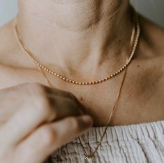 You may never take this chain off! It's so light weight and delicate, you'll love it. Choose between either 16 inches or 18 inches.  ∙ C H A I N ∙ D E T A I L S ∙  - 18k Gold Filled Ball Chain - 2.5 mm Ball Links - 16 or 18 inches -  Hypoallergenic (lead + nickel free) - Water and Tarnish Resistant ∙ G O L D ∙ F I L L E D ∙ Gold-filled components contain 100+ times more real gold than gold-plated components and are both durable and tarnish resistant. It is more affordable and accessible than sol Dainty Yellow Gold Ball Chain Jewelry, 14k Gold Necklace With Ball Chain, Gold-plated Ball Chain Necklace, Perfect As A Gift, Gold Plated Yellow Gold Ball Chain Necklace, 14k Gold-filled Ball Chain Necklace, Unique Pendant Necklace, Ball Chain Necklace, Gold Filled Ring, Jewelry Essentials