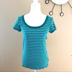 This Is A Brand New Victoria’s Secret Green Stripe Scoop Neck Tee. This Was Ordered Online And Didn’t Come With Tags But With Plastic Packaging, Which I Don’t Have Anymore. It Has Stripe Pattern With White And Mixed Beautiful Sea Green / Teal / Aqua Green Color. This T-Shirt Is Fitted And Body Hugging But Quite Stretchy. It Is A Longer Tee And Perfect To Wear With Jeans Or As A Layering Tee. It Has A Deep Scoop Neckline. Pit To Pit: 15” Length: 26” Aqua Green Color, Long Tee, Beautiful Sea, Scoop Neck Tee, Plastic Packaging, Aqua Green, Sea Green, Green Stripes, Scoop Neckline