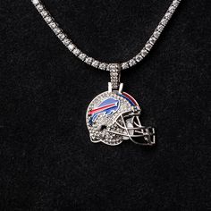 a necklace with a football helmet on it