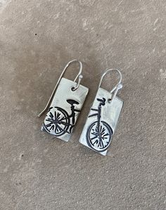 Handmade bicycle earrings feature fine silver (.999) charms hanging from sterling silver ear wires. These original kiln-fired silver earrings were designed and created in my home studio. Eco-friendly fine silver charms are made from recycled silver. Bicycle Earrings, Bottle Earrings, Recycled Silver, Bike Shop, Earrings Photo, Home Studio, Fine Silver, Silver Charms, Ear Wires