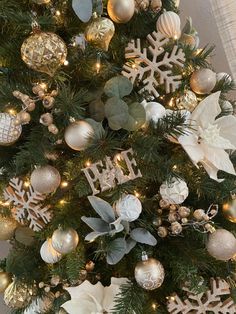 a christmas tree decorated with ornaments and lights