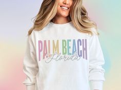 Palm Beach Sweatshirt Palm Beach Comfort Colors Preppy Palm Beach Crewneck Palm Beach Florida FL Color Gradient Rainbow Lettering ♡ PREMIUM TSHIRT and Sweatshirt by COMFORT COLORS 100% ringspun cotton preshrunk and soft washed vintage style double stitched hem, sleeves and 7/8" collar ♡ PROFESSIONALLY PRINTED to ensure quality and durability ♡ SIZING relaxed unisex fit, see size chart in photos ♡ CARE wash inside out, cold water, air dry or low heat dryer do not iron graphic or dry clean ♡ DELIV Beachy Crew Neck Top With Palm Tree Print, Playful Crew Neck T-shirt For Beach, Palm Beach Sweatshirt, Summer Beach T-shirt With Palm Tree Print, Beach Sweatshirt, Beach Palm Tree Print Cotton T-shirt, Female Owned Business, Photo Care, Beach T Shirts