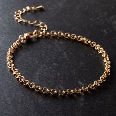 "Find the 7.5\" Gold Rolo Chain Bracelet by Bead Landing™ at Michaels. This rolo chain bracelet from Bead Landing is a wonderful piece of inspiration for your creativity. Featuring a shiny metallic finish and round links, add a fun mix of charms to craft a lovely handmade bracelet that shows off your personality. This rolo chain bracelet from Bead Landing is a wonderful piece of inspiration for your creativity. Featuring a shiny metallic finish and round links, add a fun mix of charms to craft a Permanent Jewelry Inspiration, Bead Landing, Link Chain Bracelet, Rolo Chain, Handmade Bracelet, Chain Lengths, Handmade Bracelets, Link Chain, Chain Bracelet