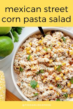 Mexican street corn pasta salad in a white bowl with whole limes, cilantro and corn on the cob Mexican Pasta Side Dishes, Side Dish For Barbeque, Southwestern Side Dishes, Sides For A Barbeque, Side Dishes For Picnic, Side Dish For Picnic, Mexican Side Dishes For Parties, Side Dishes For Fajitas, Side Dishes For Potluck