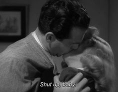 a man kissing a woman on the cheek in a black and white photo with text that reads, shut up baby