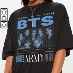 a woman wearing a black bts t - shirt with an army photo on it