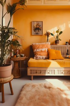 Bright and inviting boho living room featuring wicker furniture, orange couch cushion, accent pillows, green plants, and a fluffy orange rug, bathed in natural daylight. Japandi Yellow, Orange Aesthetic Room, Sunshine Bedroom, Bohemian Living Room Decor, Orange Rooms, Storage Solutions Bedroom, Living Room Orange, Yellow Room, Bedroom Orange