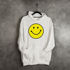 Bright Yellow Happy Smile Face Hoodie Playful Crew Neck Hoodie For Winter, Fun Cotton Hoodie, Playful Hooded Hoodie For Streetwear, Fun Cotton Hooded Hoodie, Fun Winter Hoodie, Funny Graphic Print Hoodie For Winter, Funny Cotton Hoodie For Winter, Fun Hoodie Sweatshirt With Drawstring Hood, Funny Hooded Hoodie For Streetwear