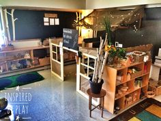 a room filled with lots of different types of furniture and decor on the walls, including bookshelves