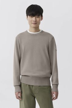 The Rosseau Crewneck Sweater is knit with seasonally appropriate Merino Wool for its breathability and soft hand feel. It has a classic crew neck with rib-knit cuffs, collar and hem. Short Parka, Men Parka, Baby Outerwear, Long Parka, Mens Parka, Snow Pants, Feel It, Soft Hand, Knit Cuff