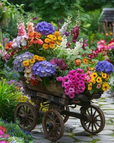 a wagon filled with lots of colorful flowers