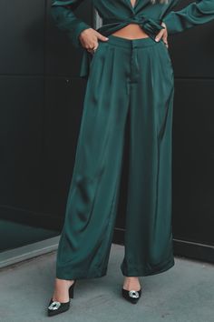 - Soft pleated wide-leg satin pants in emerald green- Side pockets- Concealed zip fly with hook-and-bar and button closure- Front pleats- Flat waistband- Designed in Sydney, Australia- Style Number: MG2303438 Model Katherine is 5'9 wearing a small SHOP THE LOOK Emerald Green Wardrobe, Green Satin Pants, Australia Style, Green Side, Satin Pants, Amazing Lace, Native Style, Pants Large, Wide Leg Pant