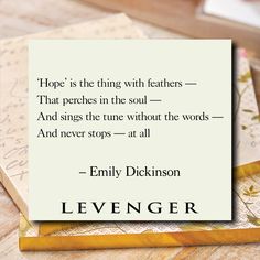 a piece of paper with an image of a quote on it that reads, hope is the thing with feathers - that perches in the soul and sings the tune without the words