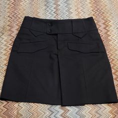 Gucci Pleated Front Classic Black Skirt Size 40 Black 80% Cotton / 25% Mohair / 23% Lana Wool / 2% Elastane Fully Lined Sits Just Below Natural Waist Thick / Belted Waistband With Double Button And Zip Closure Two Front Pockets & One Back Pocket - Still Sewn From When New (Don't Like Them Sagging With Wear So I Leave Them Stitched) Top Measures 16 Inches Across Top To Bottom Is 19 Inches Great Condition!! Luxury Black Gathered Skirt, Luxury Embroidered Black Skirt, Luxury Black Embroidered Skirt, Luxury Gucci Knee-length Skirt, Vintage Black Gathered Skirt, Gucci Skirt, Gucci Black, Black Skirt, Classic Black