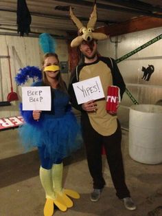 two people dressed in costumes holding signs that read keep bees and nikes on their heads