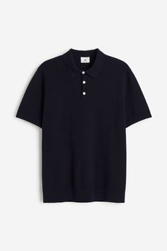 Regular-fit polo shirt in textured-knit cotton. Collar  button placket  and short sleeves. Straight hem.