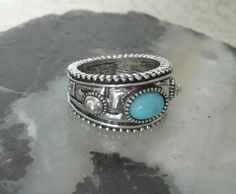 Turquoise Ring This lovely silver plated ring has a turquoise setting and beautiful engraved design. Size 9. Bohemian Silver Turquoise Ring With Stone Setting, Bohemian Turquoise Ring With Stone Setting, Silver Bohemian Turquoise Ring With Stone Setting, Bohemian Silver Concho Rings, Silver Bohemian Concho Rings, Silver Western Rings, Bohemian Cowgirl, Western Rings, Turquoise Jewelry Native American