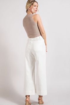 Get ready to upgrade your wardrobe with our Soft Washed Wide Leg Pants! These versatile pants feature a button closure and two front pockets for both style and function. The wide leg design offers a relaxed fit and can be worn with a belt for a tailored look. Add your favorite top and booties for a chic and comfy outfit that will keep you looking and feeling great all day.Model is 5'8" and wearing a small.Fabric Contents: 97% Cotton, 3% Spandex Care Instructions: Machine wash cold, gentle cycle, White Wide Leg Pants With Welt Pockets For Work, Beige Wide Leg Cropped Pants With Pockets, Beige Cropped Wide Leg Pants With Pockets, Chic White Wide Leg Pants With Welt Pockets, Chic Beige Cropped Wide Leg Pants, Modern White Wide Leg Pants For Work, White Cropped Wide Leg Pants For Work, Beige Cropped Wide Leg Pants For Work, White Bottoms With Belt Loops For Business Casual