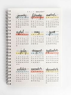 a spiral notebook with the calendar on it